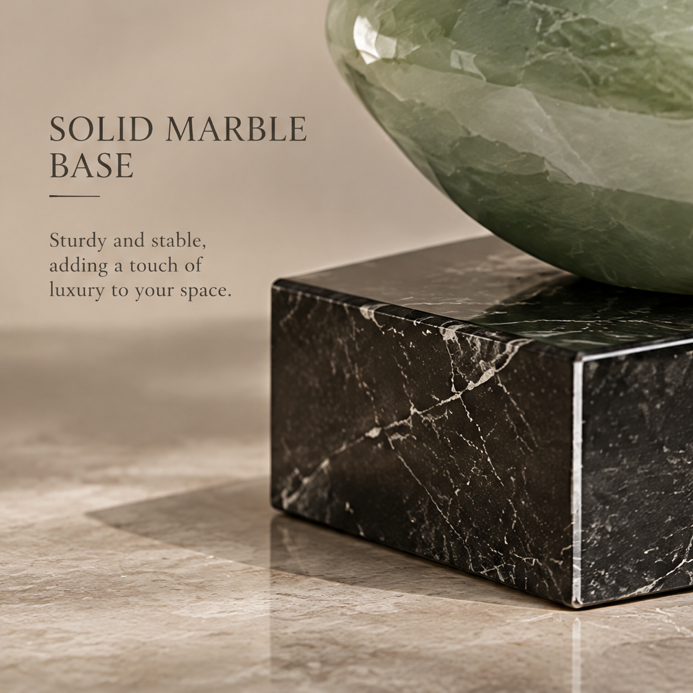 Detail of solid black marble base — Solid Marble Base, sturdy and stable, adding a touch of luxury to your space