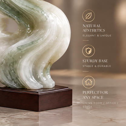 Close-up of sculpture base on dark wood plinth showing natural jade texture and sell points — Natural Aesthetics, Elegant and Unique. Sturdy Base, Stable and Durable. Perfect for Any Space